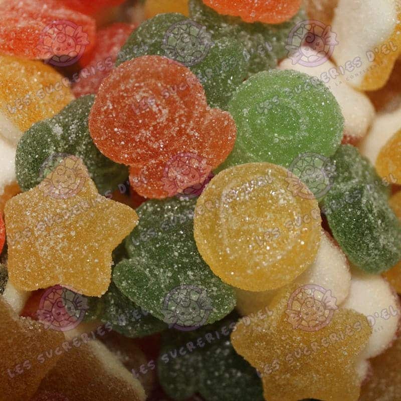 Super Mario Pik Haribo édition limitée, bonbons gélifiés acidulés en forme de pièces, étoiles et fleurs, ambiance rétro geek.